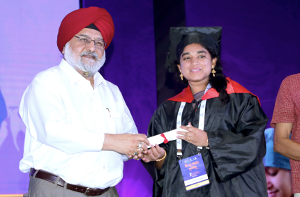 Soumitha Bhaskara receiving the certificate